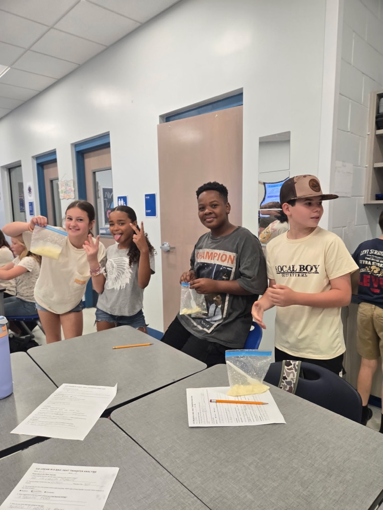 students making ice cream in science 