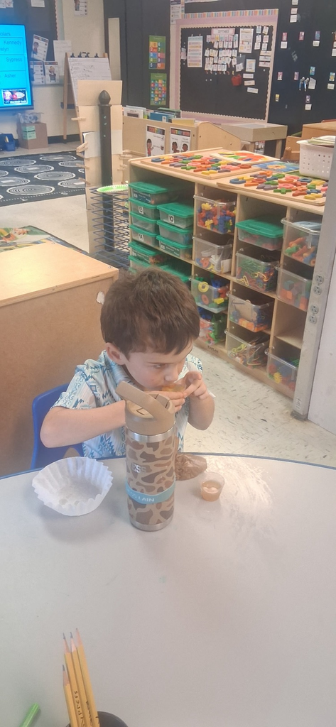 VPK student trying Apple cider or juice 