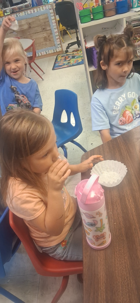 VPK student trying Apple cider or juice 