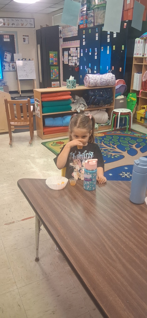 VPK student trying Apple cider or juice 