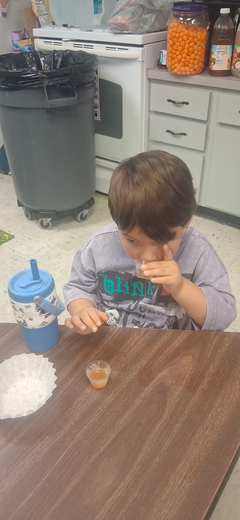 VPK student trying Apple cider or juice 