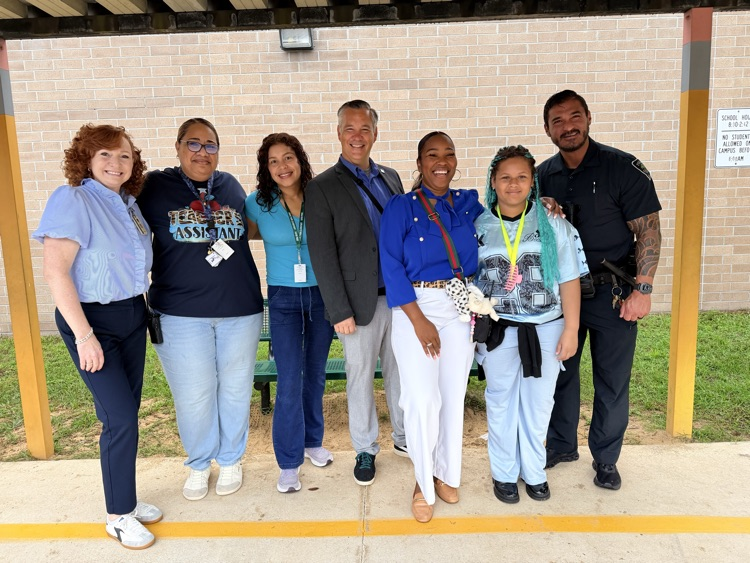 student and staff wearing blue