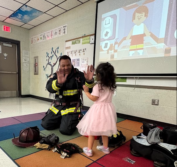 🔥 Sparking Big Smiles for Fire Prevention Week! 🧑‍🚒👩‍🚒  Ms. Richards and Mrs. Ellsworth’s class got an extra-special visit this week! Local firefighters—and proud parents of one of our awesome students—Mr. and Mrs. Diaz stopped by to teach the kids all about fire safety with a fun, hands-on lesson.  From learning how to stay safe to seeing real firefighter gear up close, our students had an absolute blast! A huge thank you to the Diaz family for spending time with us and for everything you do to keep our community safe! ❤️🚒✨  #FirePreventionWeek #CommunityHelpers #ThankYouFirefighters #PositivelyPaterson
