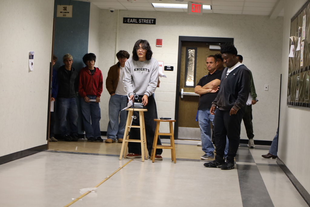Physics in action at Oakleaf High School! Students in Mr. Laberis’s AICE Physics class putting their projectile motion skills to the test with a one-shot challenge.