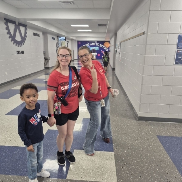 Teachers and students excited about learning on a typical day at DOE.