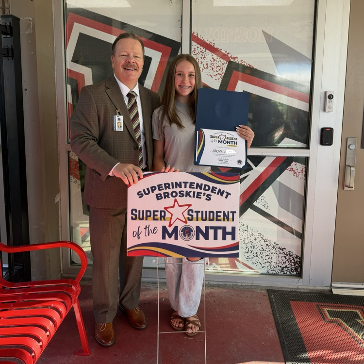 Super student of the month, Harper, with Mr. Broskie