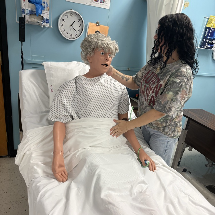 student working with patient