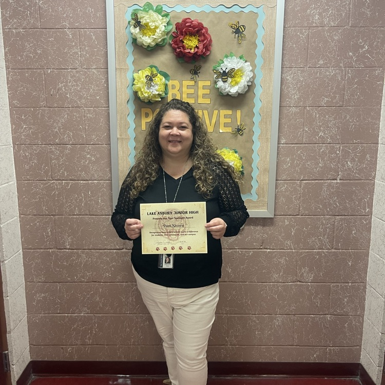 Picture of one of our ELA teachers with her recognition certificate