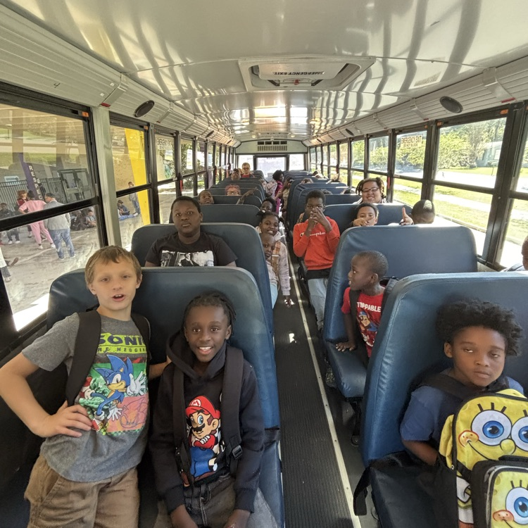 Pictures of Students and Bus Driver on School Bus