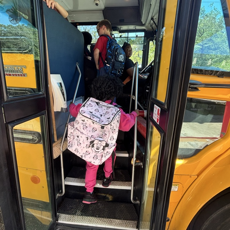 Pictures of Students and Bus Driver on School Bus
