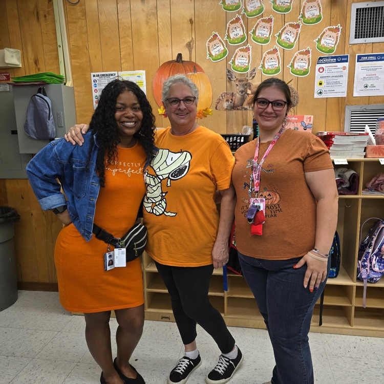 Students and staff wearing orange