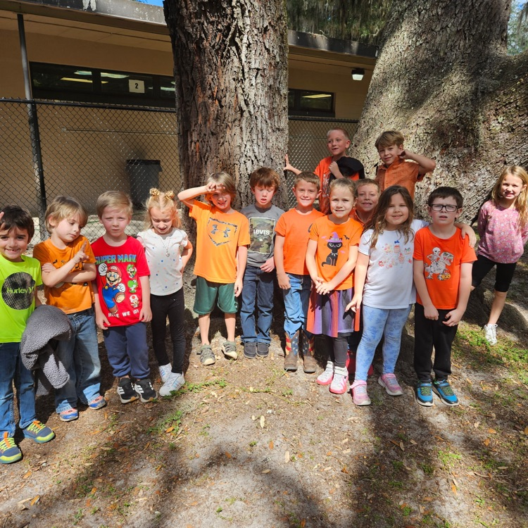 students wearing orange