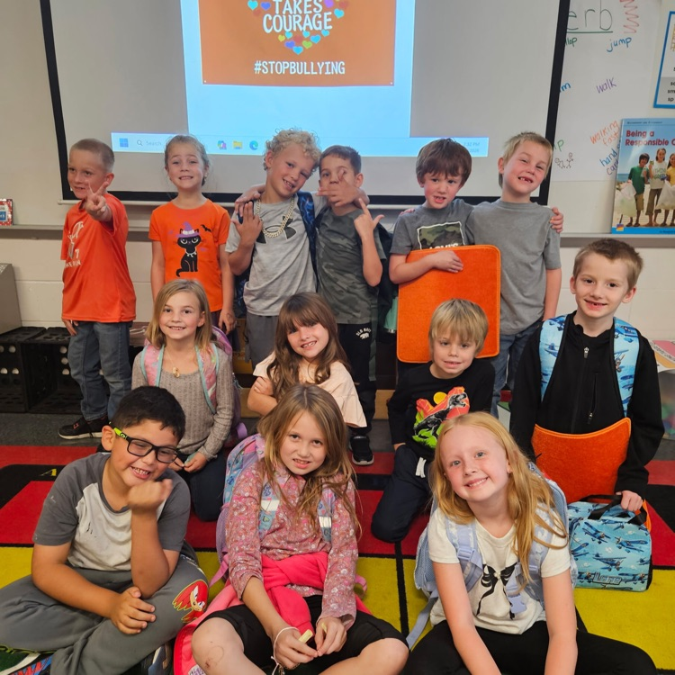 students wearing orange