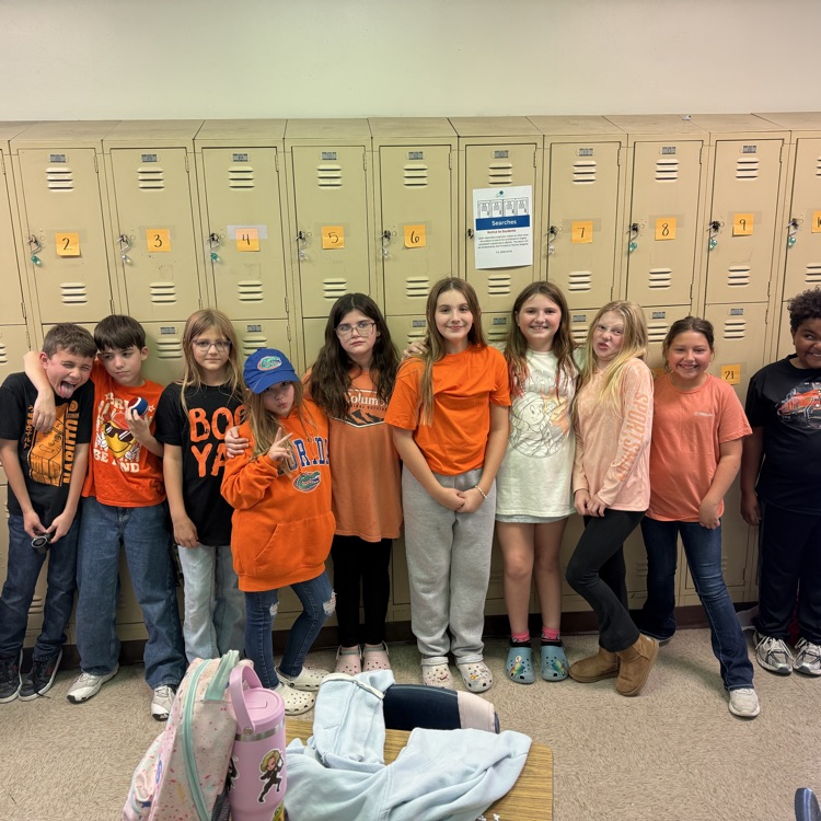 students wearing orange