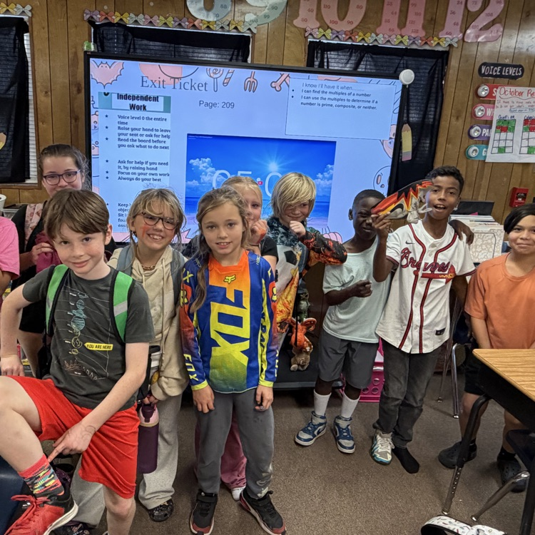 students wearing orange