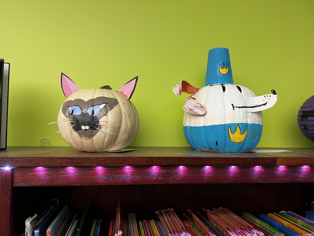 A photo of decorated book character pumpkins.