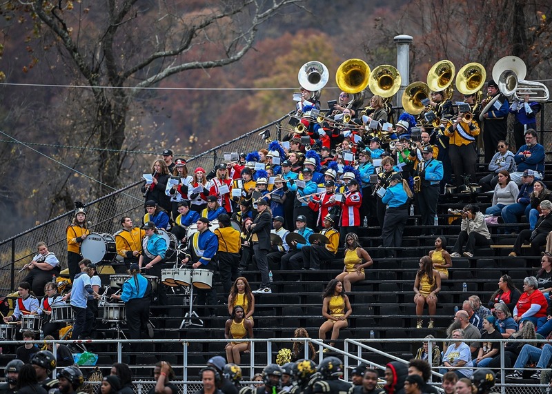 CCHS Band performs with other bands in the stands at WVSU football game