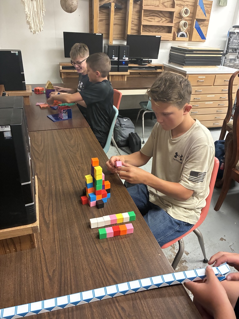 First day fun! 8th graders in Mrs. Schooley's study lab explored building figures with various manipulatives today. #celebrate379