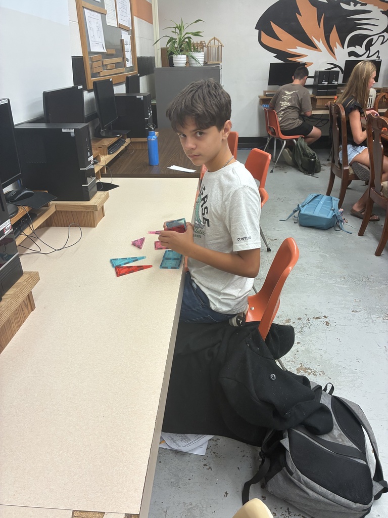 First day fun! 8th graders in Mrs. Schooley's study lab explored building figures with various manipulatives today. #celebrate379