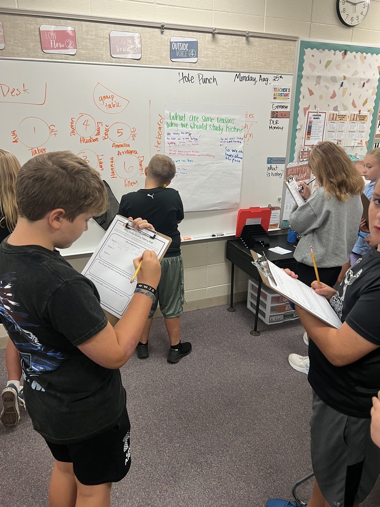 This week in Mrs. Chestnut’s 5th grade social studies classes, students are diving deep into two big questions: “What is a historian?” and “Why do we study history?” 🕰️ Today, they took part in a gallery walk where they explored thought-provoking questions, sparked meaningful discussions, and made connections that brings the past to life. We love watching their curiosity and critical thinking grow! 👏📚 #celebrate379
