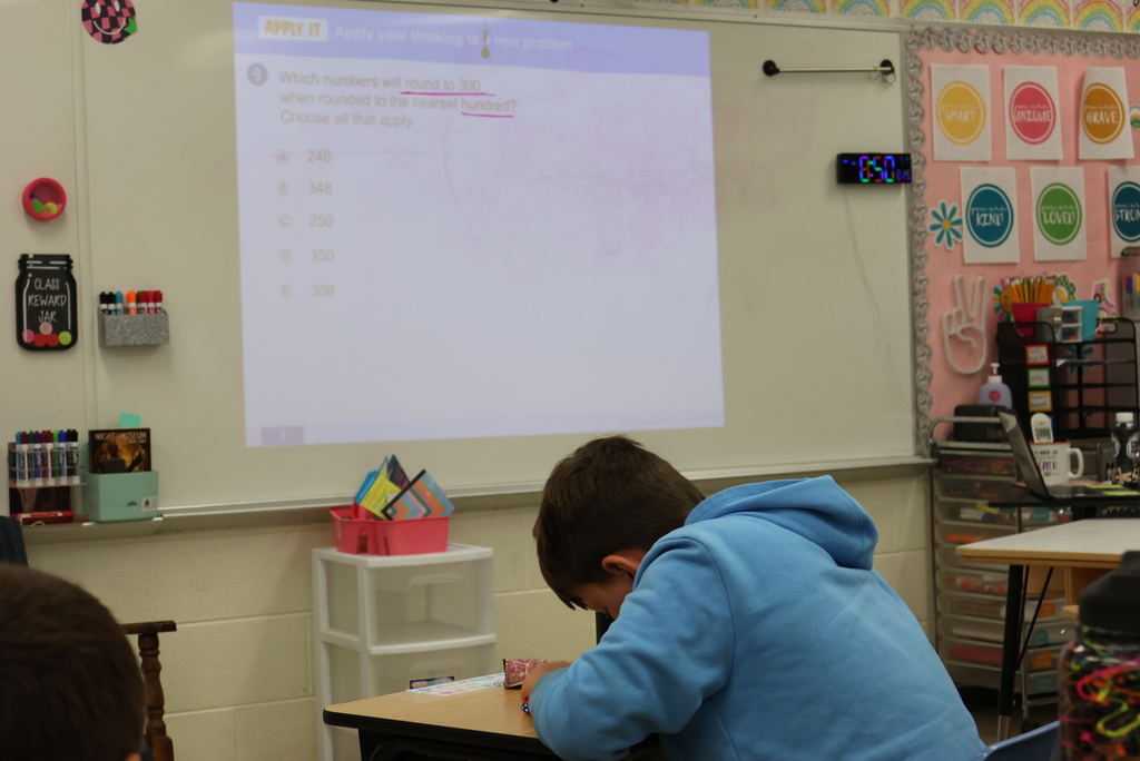 Ms. Reyer's 4th graders hit the ground running their year in math by reviewing rounding numbers. #celebrate379