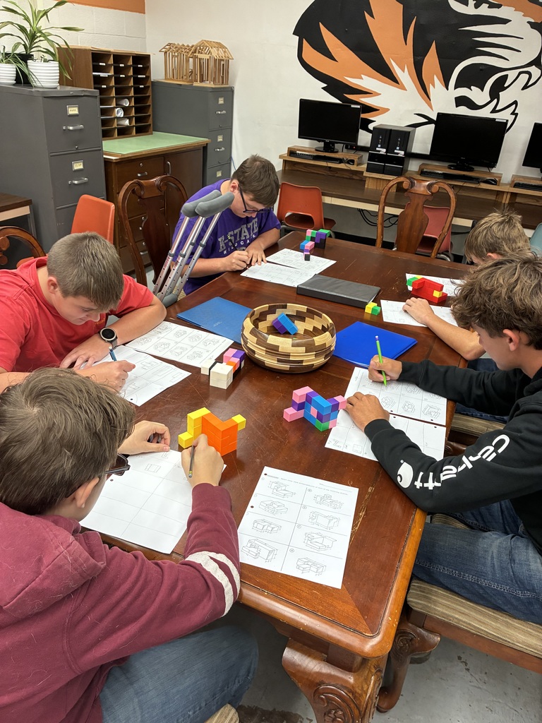Mrs. Schooley's CAD I students are getting hands-on with 3-D design! Using cubes, they’re building shapes and then sketching what those figures look like from the top, front, and right views. A great way to begin combining creativity with critical thinking! 🧩📐 #celebrate379