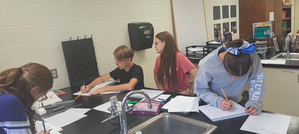 8th grade science is working on a Lab to learn about the transfer of Energy. This Lab is called "Drive the Nail". Before they could begin any kind of lab work, students were required to learn lab safety rules and why they are so important.  They are off and running in Mrs. Trembath's class! #celebrate379