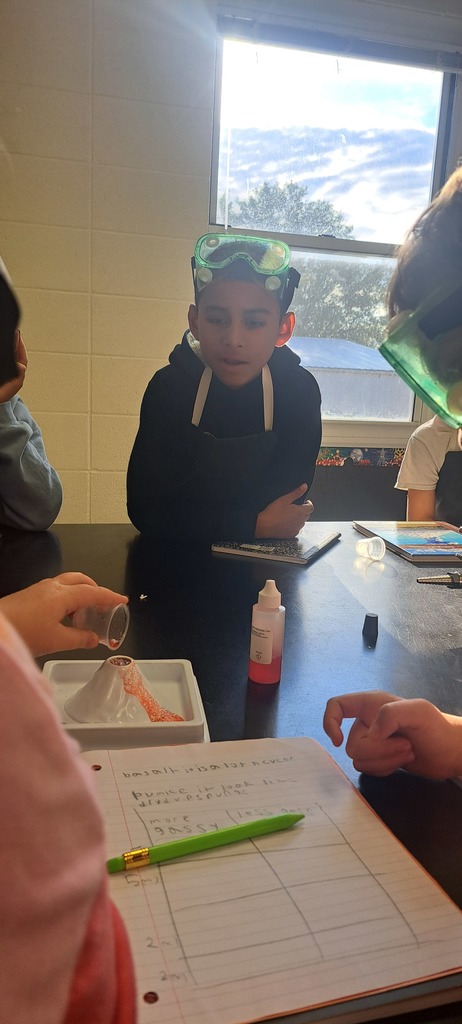🌋 Mrs. Trembath's 6th graders turned up the heat in science class today! Working in teams, they added “magma” to their volcanoes and watched the effects of different levels and reactants. The results were EXPLOSIVE!  🔥💥 #celebrate379
