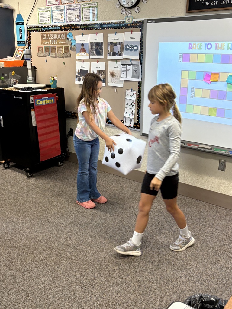 As always, Mrs. Edwards' 3rd grade class is expected to keep up with her energy level! Last week, they played a review addition dice game with some BIG dice! They also regularly play a game called Addition Splat. And today, they were using a Brain Break to upgrade their hand/eye coordination! Never a dull moment in her classroom! #celebration
