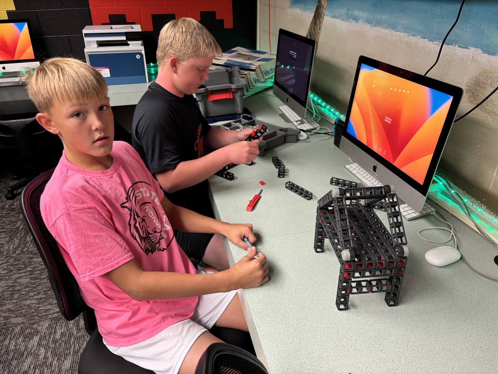 Mr. Lane's 7th grade computers/technology students have been putting their brains to the test this past week! First, they built bridges using a limited "budget" to see which structures could hold a stack of books. Then, they took to the air with their drones! The assignment was to code the drones to fly around the school filming each area, which then would turn into a virtual tour of the building.  #celebrate379