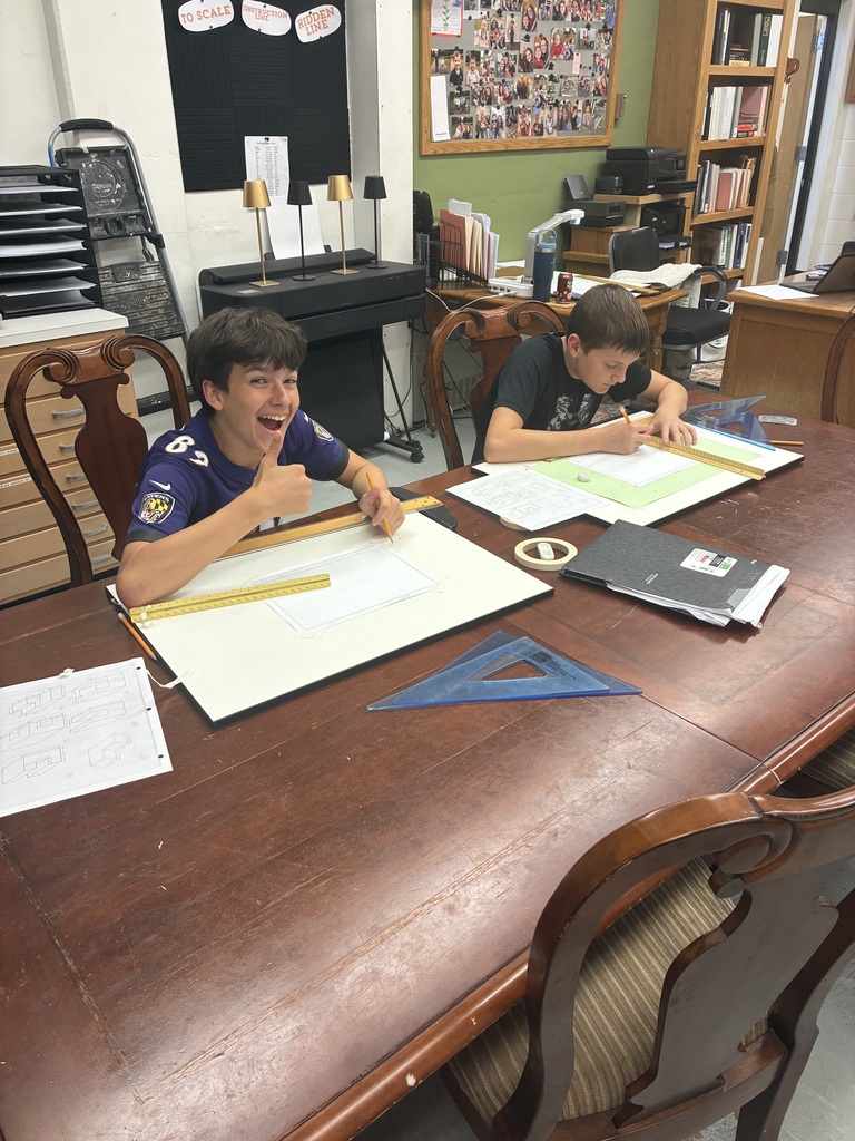 Mrs. Schooley's 8th grade industrial arts classes are putting together all their new knowledge to construct their three views using orthographic projection., which is a method of representing a three-dimensional object in two dimensions by projecting its features onto a plane using parallel lines that are perpendicular (orthogonal) to the projection plane. Construction and art rolled up into one! #celebrate379