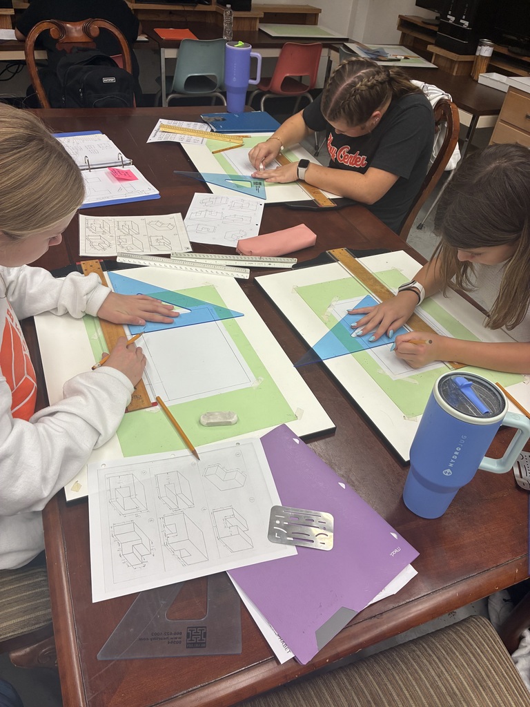 Mrs. Schooley's 8th grade industrial arts classes are putting together all their new knowledge to construct their three views using orthographic projection., which is a method of representing a three-dimensional object in two dimensions by projecting its features onto a plane using parallel lines that are perpendicular (orthogonal) to the projection plane. Construction and art rolled up into one! #celebrate379
