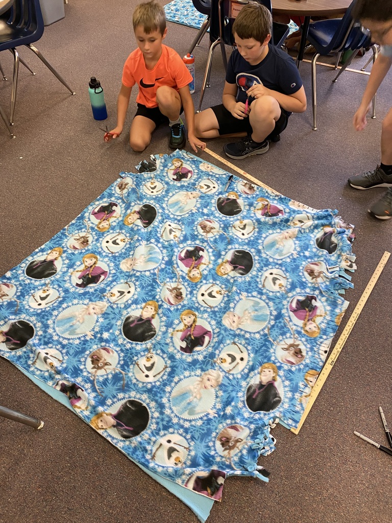 During her Bengal Innovators time, Miss Bott’s group measured, cut, and tied fleece fabric to create tie blankets. Students marked out inch by inch to ensure each tie was spaced evenly apart. They then chose places around the community to donate these blankets. Places chosen were the Lighthouse for Christ, the Hope House, a local church, and the Clay County EMT. What a great community project! #celebrate379