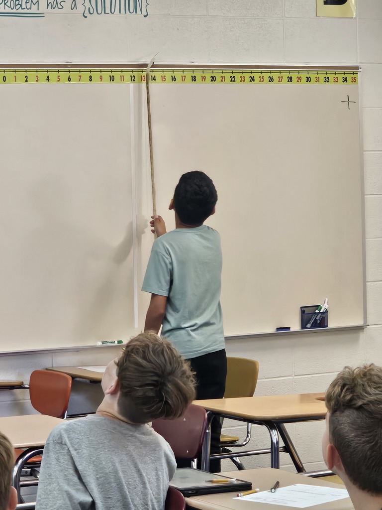 Mrs. Bybee's 6th Graders "walked the line" yesterday! Students modeled adding integers with the help of Mr. Inn. Some made their own Mr. or Mrs. Inn to help! #celebrate379