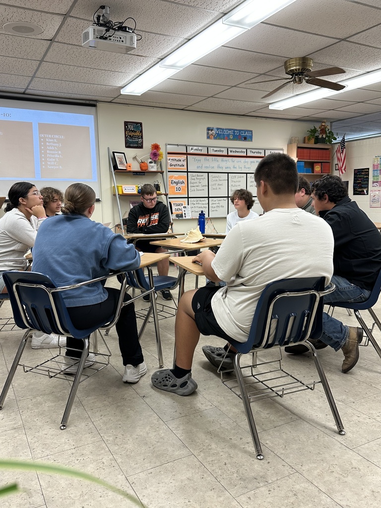 Mrs. Reichert's English 10 students wrapped up first quarter with a “deep dive” Socratic Discussion about the deeper meaning of William Golding’s novel “Lord of the Flies.” (Note the inspirational conch shell in the center of the circle!) #celebrate379