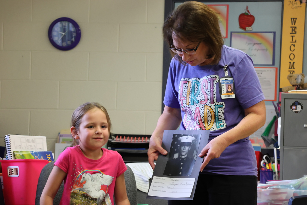 One of the neat experiences for first graders at Lincoln is the Veteran's Day wall. Families bring in photos and information on veterans or those currently in the military who are family members. Students learn about these individuals, and then they are posted along the hallways for everyone else to view. It is a great learning experience for the kids, who get to ask questions and learn more about our heroes! #celebrate379