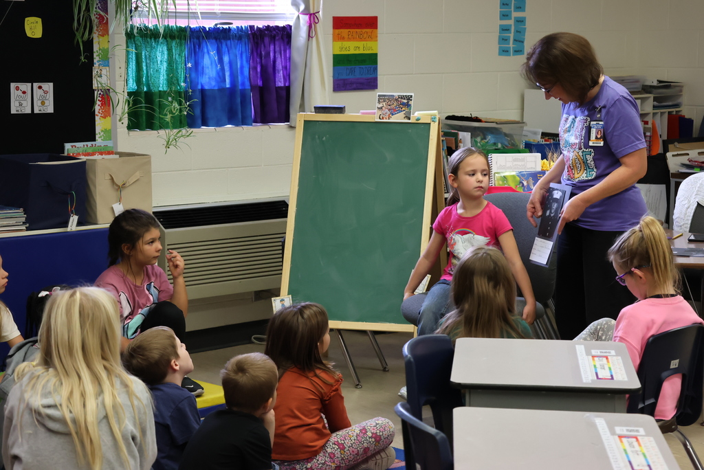 One of the neat experiences for first graders at Lincoln is the Veteran's Day wall. Families bring in photos and information on veterans or those currently in the military who are family members. Students learn about these individuals, and then they are posted along the hallways for everyone else to view. It is a great learning experience for the kids, who get to ask questions and learn more about our heroes! #celebrate379