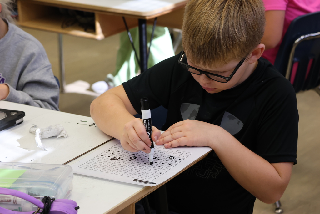 Mrs. Peterson started her math class with an intense competition between her and Ms. Brownell's students to see who could complete 2-digit division problems the fastest. As you can see, they were fully engaged! #celebrate379