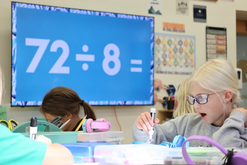 Mrs. Peterson started her math class with an intense competition between her and Ms. Brownell's students to see who could complete 2-digit division problems the fastest. As you can see, they were fully engaged! #celebrate379