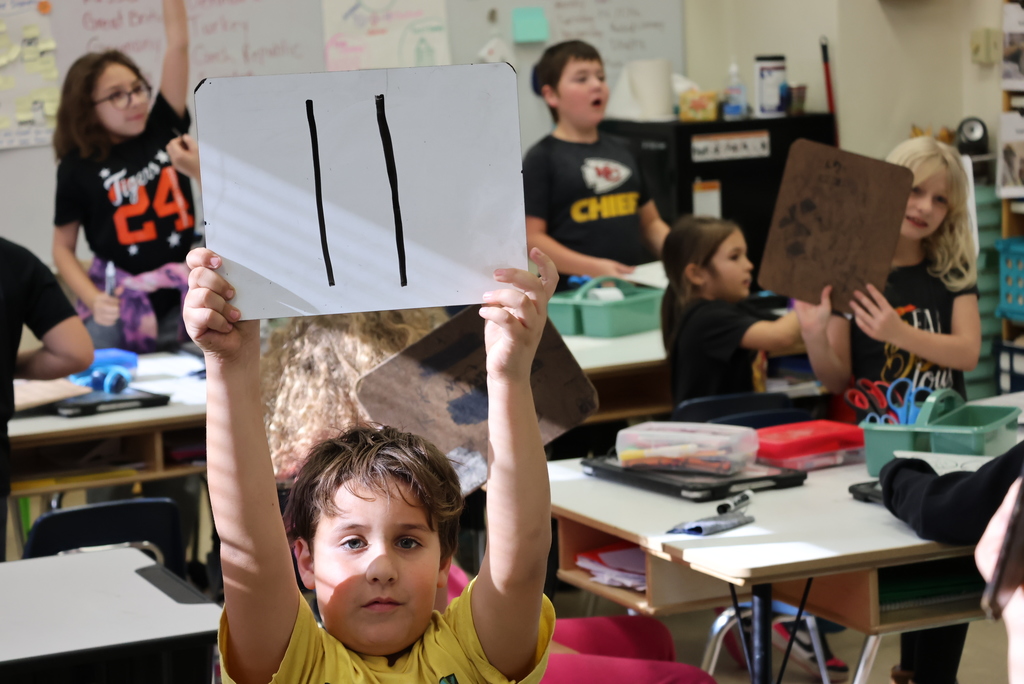 Mrs. Peterson started her math class with an intense competition between her and Ms. Brownell's students to see who could complete 2-digit division problems the fastest. As you can see, they were fully engaged! #celebrate379