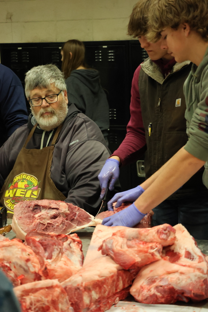 Forget the turkey, Mr. Craig's students were serving up ham this morning!  Schwartz Farms was nice enough to donate a hog for this learning activity, and the Clay Center Locker Plant killed and delivered it whole to the CCCHS Ag garage. After that, it was the students' turn to butcher from whole hog down to all of the parts!  Thanks to Lee Weiss, a retired Ag teacher and FFA advisor, who donated his morning to teach the students all about the butchering process. As you can see, it was a hands-on process!  Some of the pork will be eaten at FFA events, and some will be donated to the Lighthouse. All of it was a great learning experience! #celebrate379