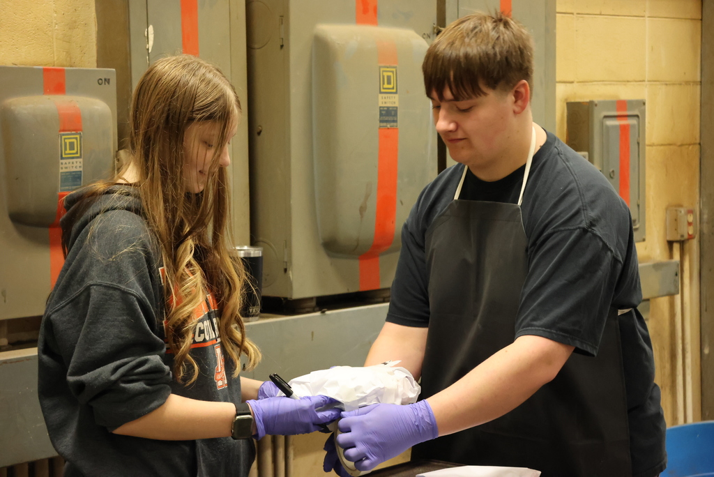 Forget the turkey, Mr. Craig's students were serving up ham this morning!  Schwartz Farms was nice enough to donate a hog for this learning activity, and the Clay Center Locker Plant killed and delivered it whole to the CCCHS Ag garage. After that, it was the students' turn to butcher from whole hog down to all of the parts!  Thanks to Lee Weiss, a retired Ag teacher and FFA advisor, who donated his morning to teach the students all about the butchering process. As you can see, it was a hands-on process!  Some of the pork will be eaten at FFA events, and some will be donated to the Lighthouse. All of it was a great learning experience! #celebrate379