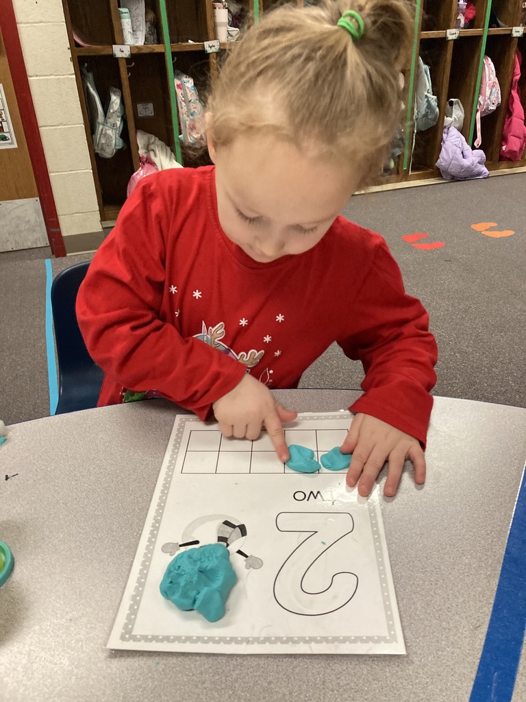 One-to-one object correspondence and number writing were practiced yesterday in Mrs. Bruggeman's PreK class, along with fine motor skills using play dough and dry erase markers! #celebrate379