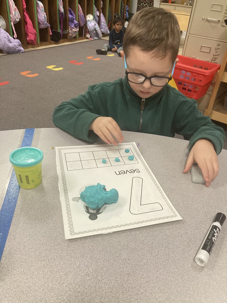 One-to-one object correspondence and number writing were practiced yesterday in Mrs. Bruggeman's PreK class, along with fine motor skills using play dough and dry erase markers! #celebrate379
