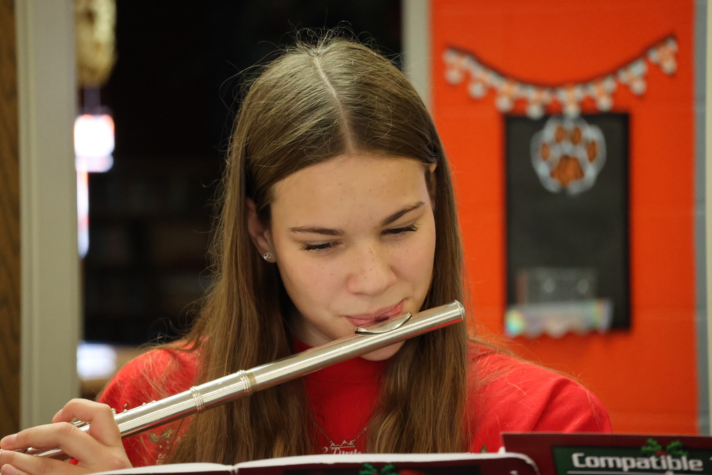Select members of the CCCHS band surprised community members by playing Christmas songs around the community yesterday... including at Garfield! #celebrate379