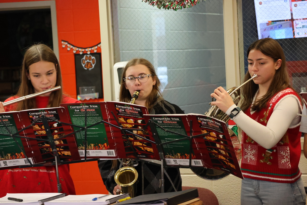 Select members of the CCCHS band surprised community members by playing Christmas songs around the community yesterday... including at Garfield! #celebrate379