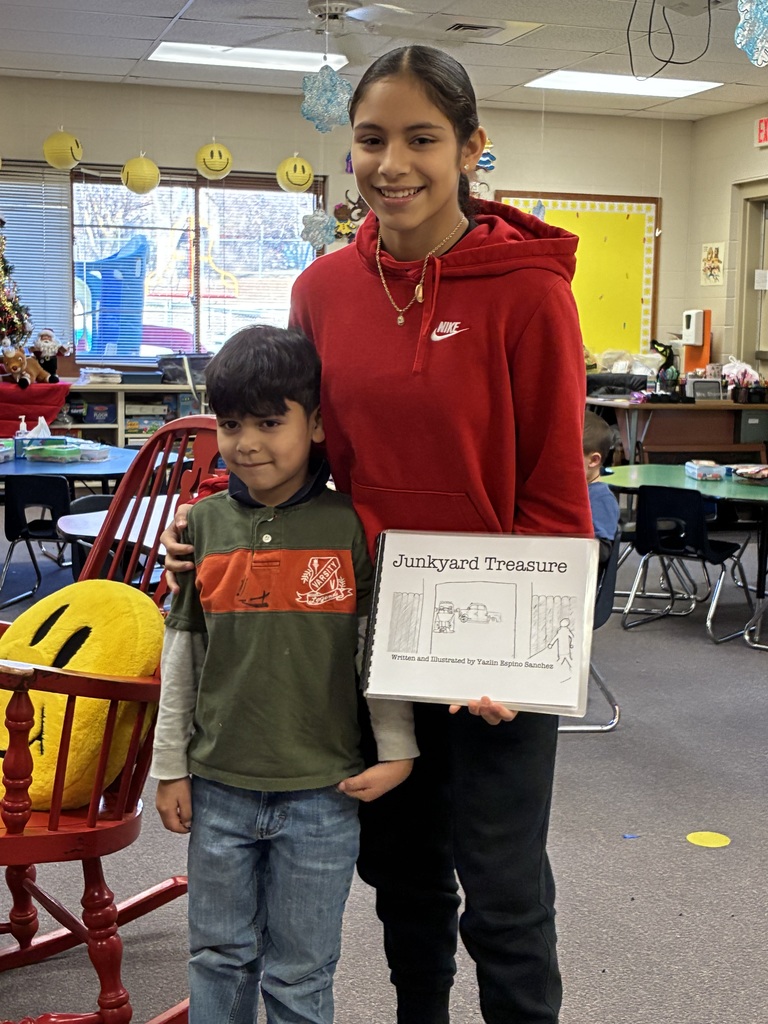 CCCMS 8th graders, Yazlin and Jeanese, participated in a creative writing study lab first quarter. Yesterday, they shared their final products with Mrs. Shannon’s kindergarten students. These two read their stories, then they gave each of Mrs. Shannon’s kindergarteners their own autographed copy!   Jeanese first had the idea for The Tiger with the Magic Tail when she was four. This story has been a passion project for a decade, and her colorful designs made the story come to life.   Yazlin was inspired to write Junkyard Treasure because of her little brother, one of Mrs. Shannon’s current kindergarten students. He loves trucks and projects, and his excitement at hearing the story for the first time today was contagious!   Great work, Jeanese and Yazlin! #celebrate379