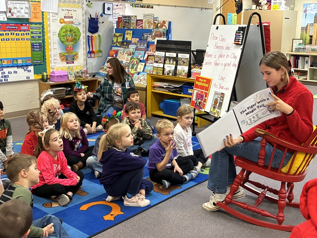 CCCMS 8th graders, Yazlin and Jeanese, participated in a creative writing study lab first quarter. Yesterday, they shared their final products with Mrs. Shannon’s kindergarten students. These two read their stories, then they gave each of Mrs. Shannon’s kindergarteners their own autographed copy!   Jeanese first had the idea for The Tiger with the Magic Tail when she was four. This story has been a passion project for a decade, and her colorful designs made the story come to life.   Yazlin was inspired to write Junkyard Treasure because of her little brother, one of Mrs. Shannon’s current kindergarten students. He loves trucks and projects, and his excitement at hearing the story for the first time today was contagious!   Great work, Jeanese and Yazlin! #celebrate379
