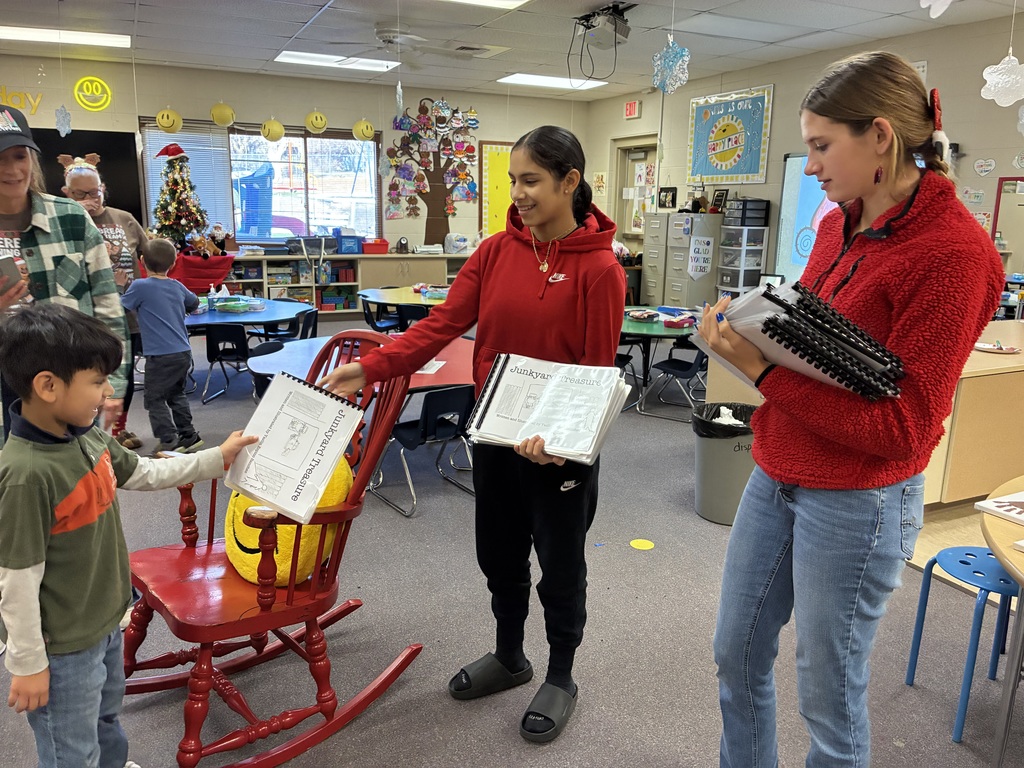 CCCMS 8th graders, Yazlin and Jeanese, participated in a creative writing study lab first quarter. Yesterday, they shared their final products with Mrs. Shannon’s kindergarten students. These two read their stories, then they gave each of Mrs. Shannon’s kindergarteners their own autographed copy!   Jeanese first had the idea for The Tiger with the Magic Tail when she was four. This story has been a passion project for a decade, and her colorful designs made the story come to life.   Yazlin was inspired to write Junkyard Treasure because of her little brother, one of Mrs. Shannon’s current kindergarten students. He loves trucks and projects, and his excitement at hearing the story for the first time today was contagious!   Great work, Jeanese and Yazlin! #celebrate379