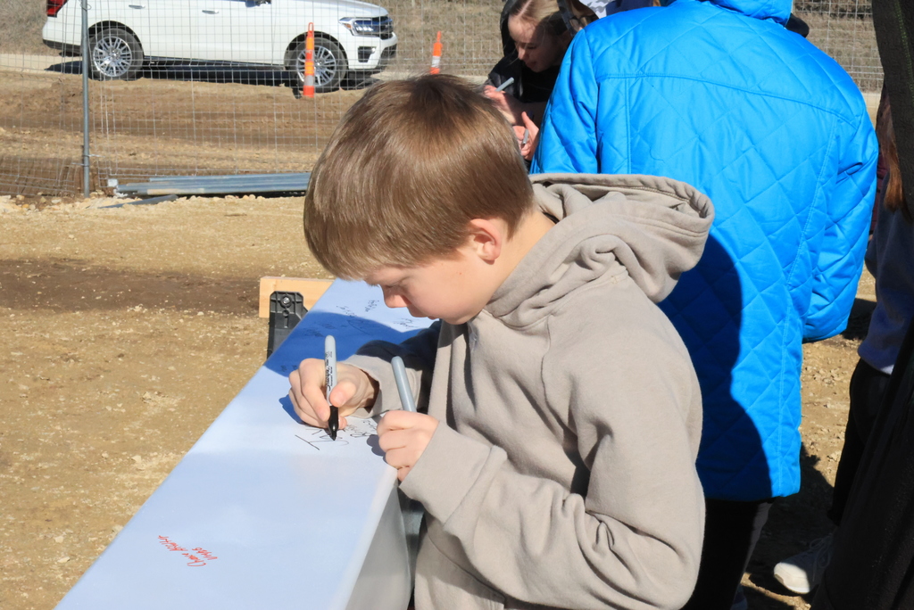 Mrs. Koster's 6th grade ELA students took time this morning to head down the block and sign one of the beams going up in the new Multigenerational Life Center! #celebrate379